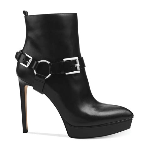 michael kors black heel white bottom bootie|Michael Kors black boots women.